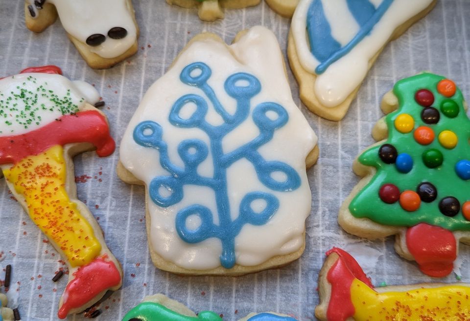 Christmas cookie decorated as the Home Assistant logo.